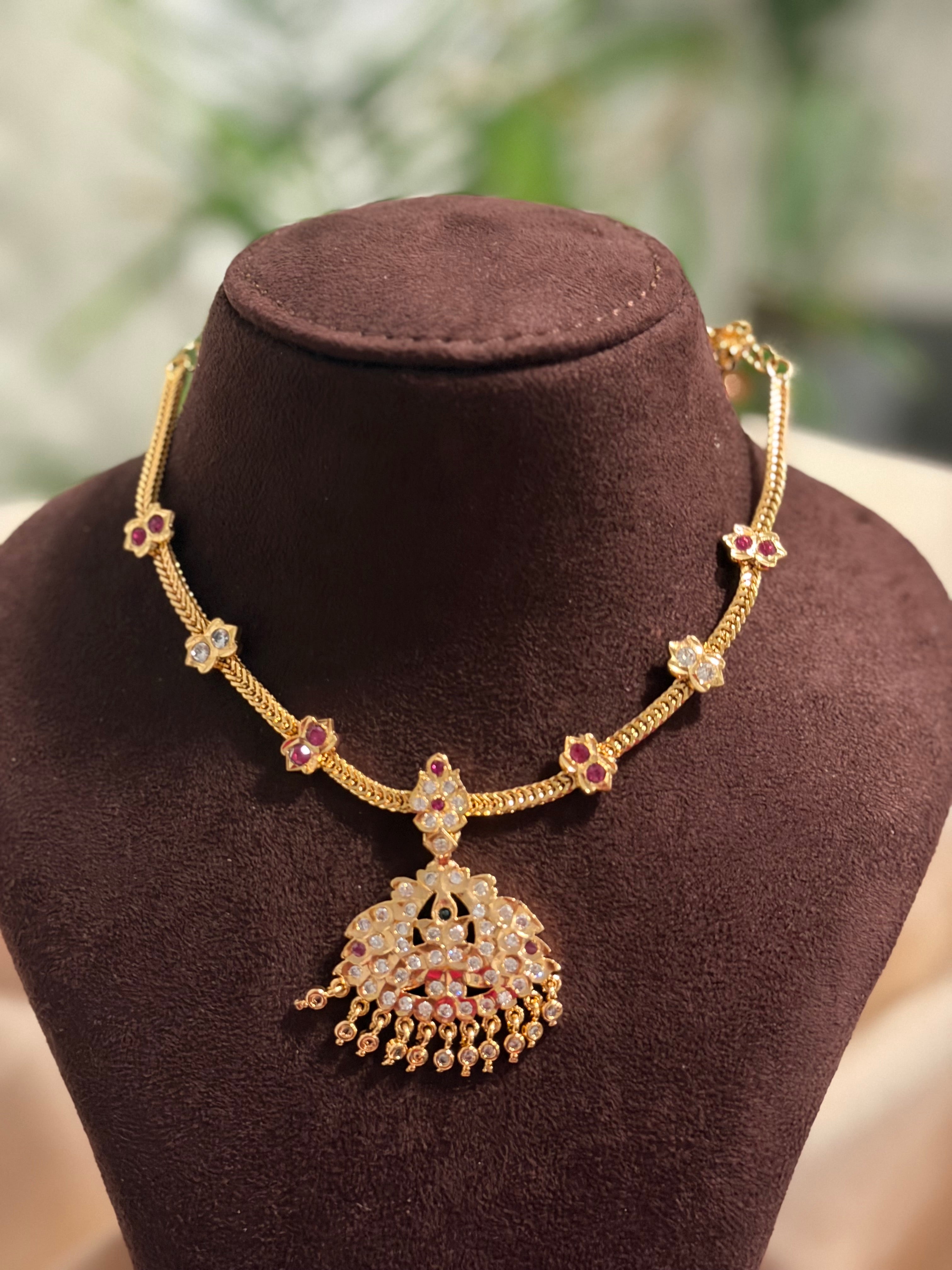 Ruby and White stone Attigai with some pendent designs